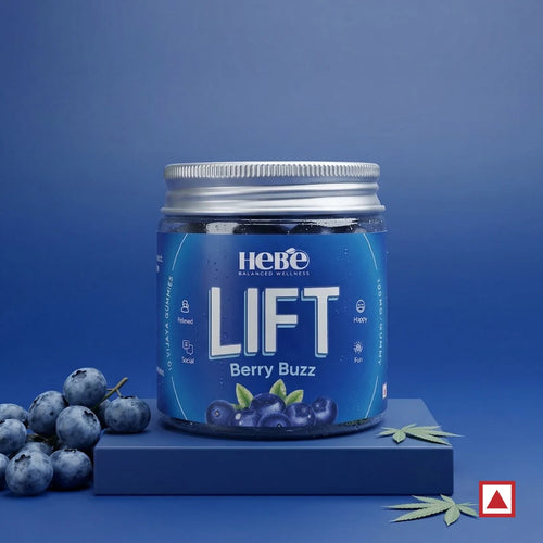 Jar of Hebe Lift Berry Buzz on a blue background with blueberries and cannabis leaves.