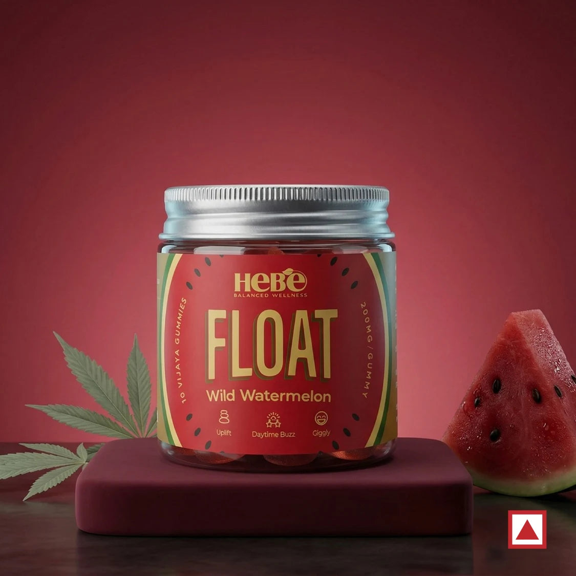 Jar of 'Float Wild Watermelon' by Hero on a red background with watermelon slices and leaves.