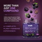 A jar of Hebe Zest Berry Boom vijaya gummies 500mg, plant-forward gummies on a dark purple background with floating berries and text highlighting key ingredients and benefits.